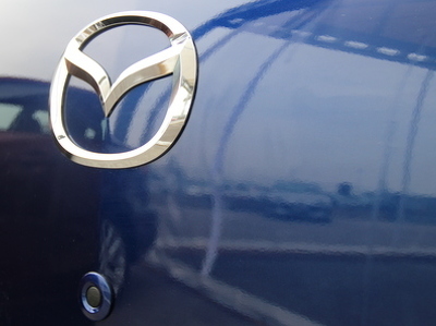 Mazda    200 000  -  