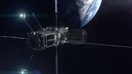 Аппарат MEV-2, пристыковавшийся к спутнику (художественное изображение).