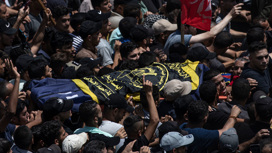 Тысячи палестинцев простились с жертвами израильского "Рассвета"