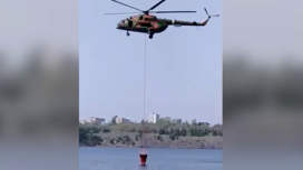 Борьбу с лесными пожарами ведут экипажи Ми-8 армейской авиации ЦВО