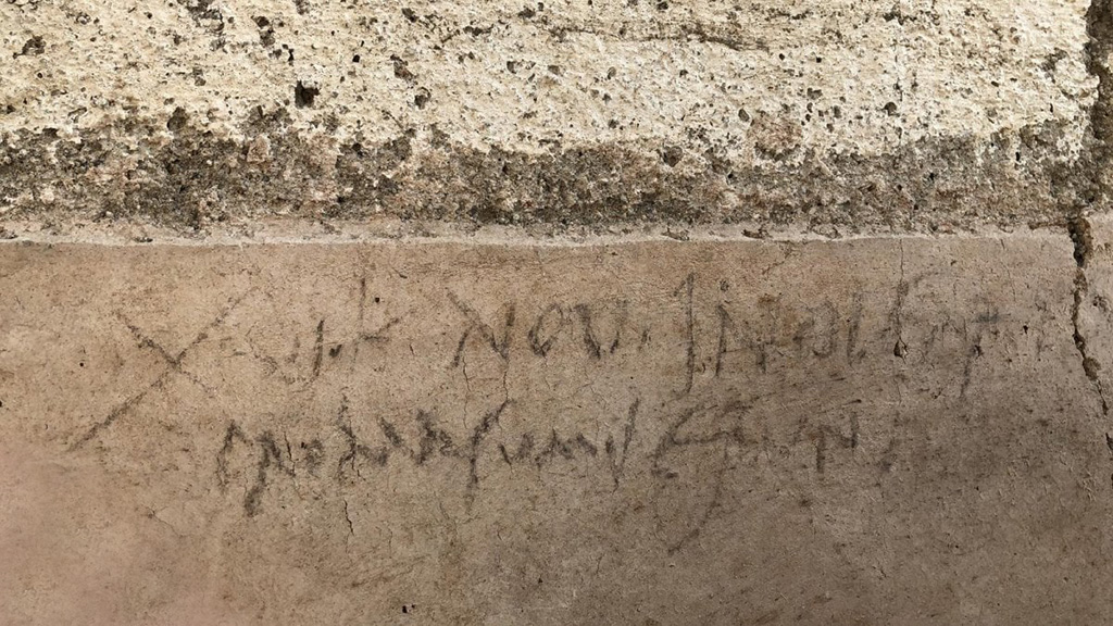 Надпись углем на стене жилого помещения в Доме с садом. Фото: Archaeological site of Pompeii